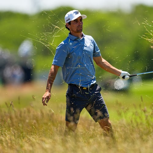 Joaquin Niemann hits from the rough on the third hole during a practice round for the U.S. Open golf tournament at Shinnecock Hills Golf Club in Southampton, N.Y., Tuesday, June 16, 2026.(AP Photo/George Walker IV)