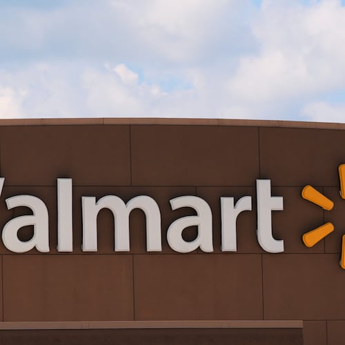 The Walmart logo is displayed on a store, Aug. 14, 2025, in Manchester, N.H. (AP Photo/Charles Krupa, File)