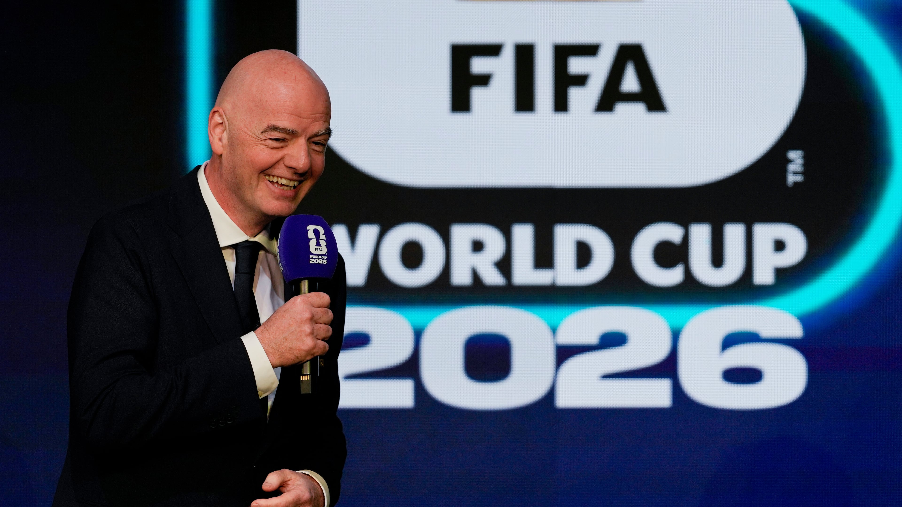 FIFA President Gianni Infantino speaks during the match schedule reveal for the 2026 soccer World Cup in Washington, Saturday, Dec. 6, 2025. (AP Photo/Chris Carlson)