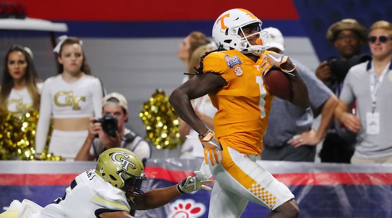September 4, 2017 Atlanta: Georgia Tech defensive back A.J. Gray canât stop Tennessee wide receiver Marquez Callaway from scoring during the fourth quarter in a NCAA college football game on Monday, September 4, 2017, in Atlanta. Curtis Compton/ccompton@ajc.com