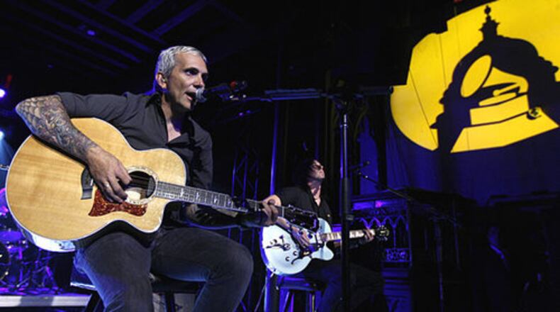 Musician Art Alexakis, of Everclear, performs with the band at the Grammy's Rock The Conventions concert in Denver.