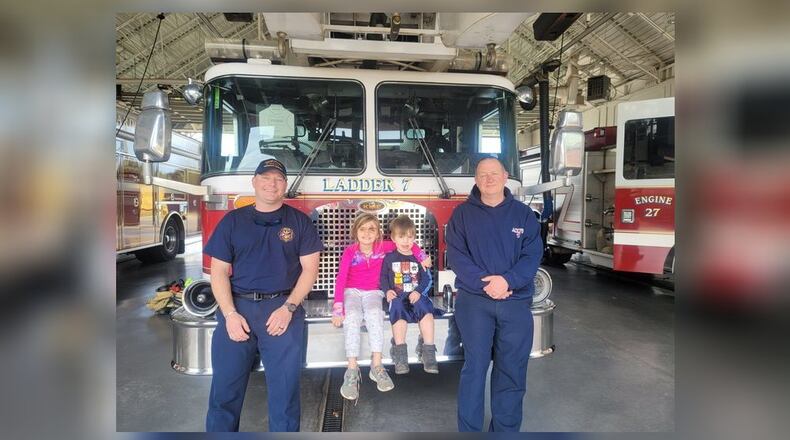 Athens-Clarke firefighters reunite with an 8-year-old girl whom they treated after she was bitten in the face by a dog and severely injured Feb. 20.