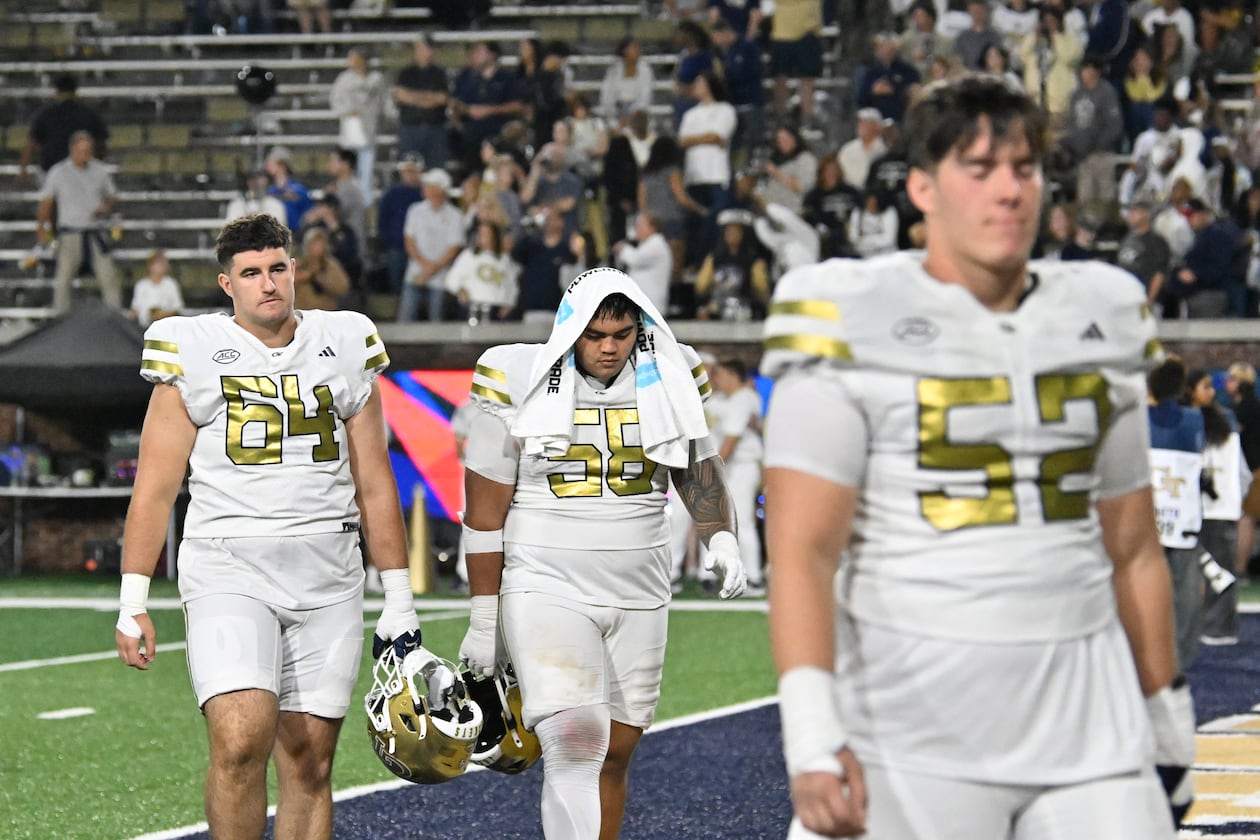 Georgia Tech players leave the field after Pittsburgh beat Georgia Tech during an NCAA college football game at Bobby Dodd Stadium, Saturday, November 22, 2025, in Atlanta. Pittsburgh won 42-28 over Georgia Tech. (Hyosub Shin/AJC)