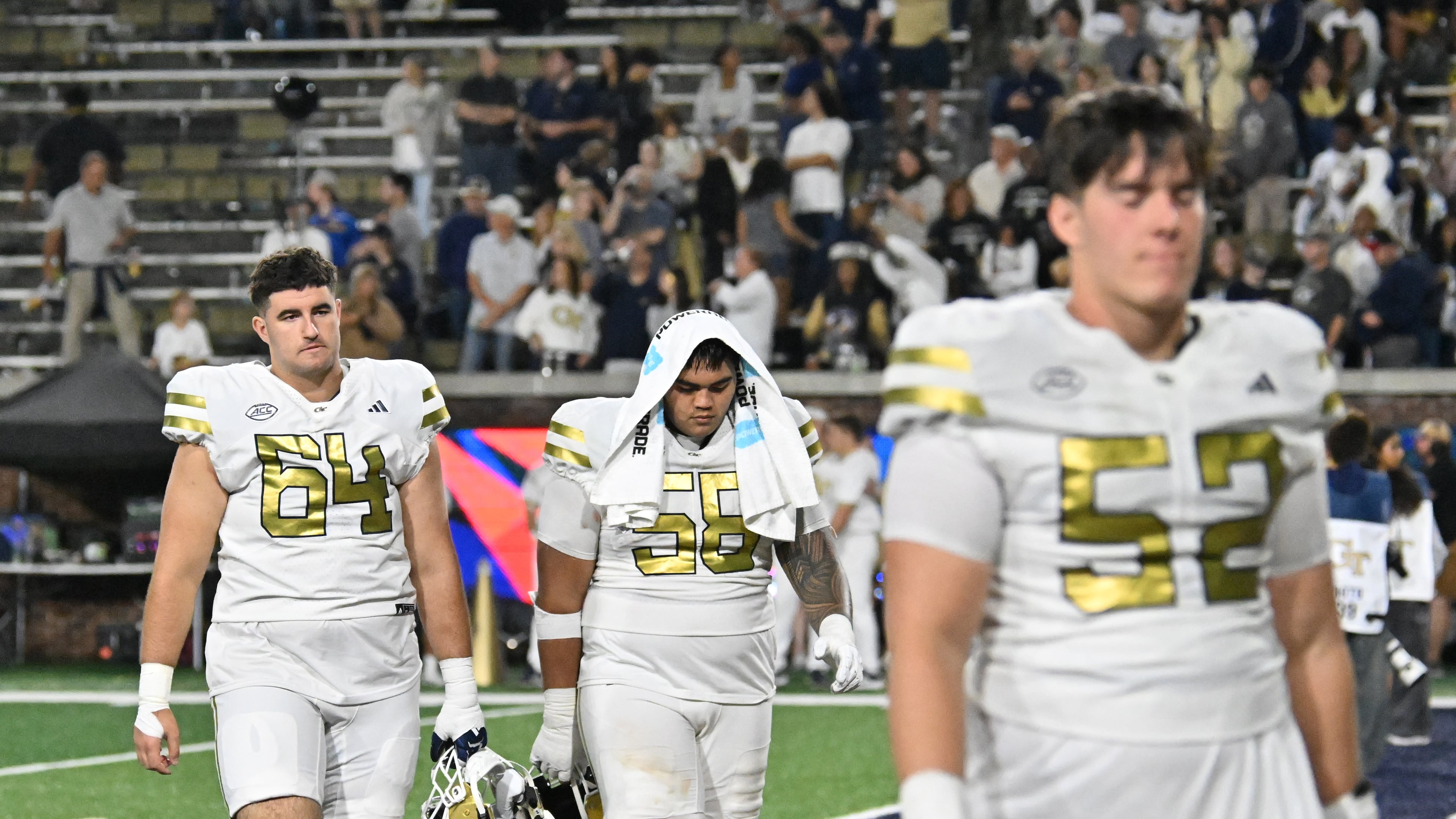Georgia Tech players leave the field after Pittsburgh beat Georgia Tech during an NCAA college football game at Bobby Dodd Stadium, Saturday, November 22, 2025, in Atlanta. Pittsburgh won 42-28 over Georgia Tech. (Hyosub Shin/AJC)