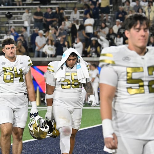 Georgia Tech players leave the field after Pittsburgh beat Georgia Tech during an NCAA college football game at Bobby Dodd Stadium, Saturday, November 22, 2025, in Atlanta. Pittsburgh won 42-28 over Georgia Tech. (Hyosub Shin/AJC)