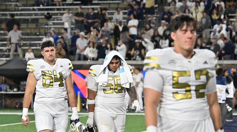 Georgia Tech players leave the field after Pittsburgh beat Georgia Tech during an NCAA college football game at Bobby Dodd Stadium, Saturday, November 22, 2025, in Atlanta. Pittsburgh won 42-28 over Georgia Tech. (Hyosub Shin/AJC)