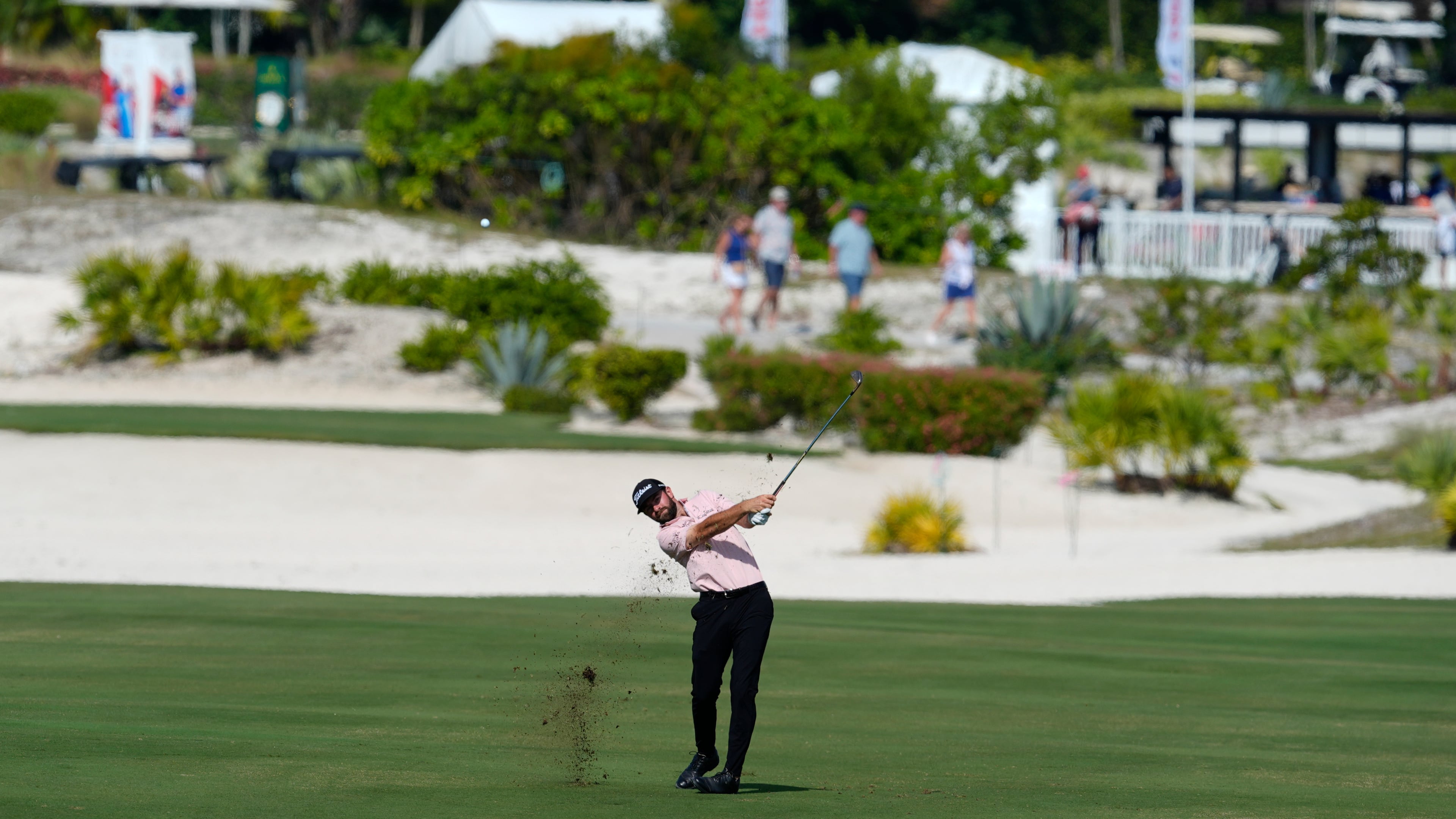 Cameron Young, of the United States, watches his shot from the first fairway during the second round of the Hero World Challenge PGA Tour at the Albany Golf Club, in New Providence, Bahamas, Friday, Dec. 5, 2025. (AP Photo/Fernando Llano)