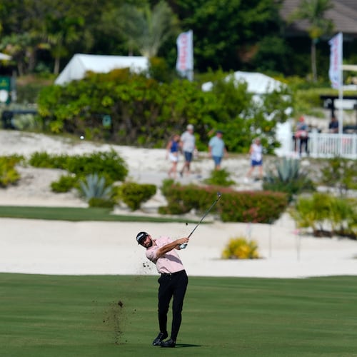 Cameron Young, of the United States, watches his shot from the first fairway during the second round of the Hero World Challenge PGA Tour at the Albany Golf Club, in New Providence, Bahamas, Friday, Dec. 5, 2025. (AP Photo/Fernando Llano)