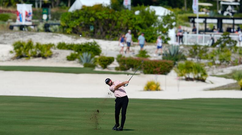 Cameron Young, of the United States, watches his shot from the first fairway during the second round of the Hero World Challenge PGA Tour at the Albany Golf Club, in New Providence, Bahamas, Friday, Dec. 5, 2025. (AP Photo/Fernando Llano)