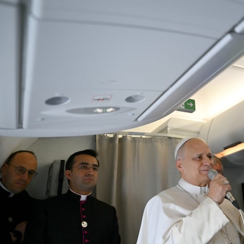 Pope Leo XIV speaks to journalists aboard his flight bound for Algiers’ Houari Boumédiène International Airport on Monday, April 13, 2026, at the start of an 11-day apostolic journey to Africa. (Alberto Pizzoli/Pool Photo via AP)