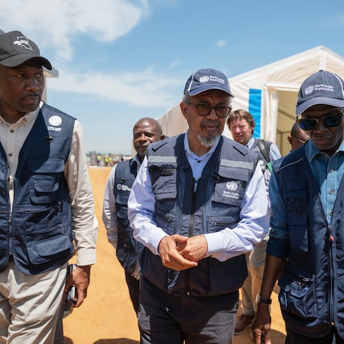Director General of the World Health Organisation (WHO), Tedros Adhanom Ghebreyesus, center, arrives in Bunia, Congo, Saturday, May 30, 2026. (AP Photo/Moses Sawasawa)
