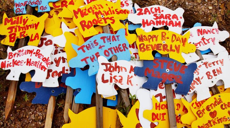 Poole's Bar-B-Q is home to the Pig Hill of Fame. / AJC file photo