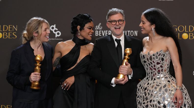 Sara Murphy, from left, Teyana Taylor, Paul Thomas Anderson, and Chase Infiniti pose in the press room with the award for best motion picture – musical or comedy for "One Battle After Another" during the 83rd Golden Globes on Sunday, Jan. 11, 2026, at the Beverly Hilton in Beverly Hills, Calif. (AP Photo/Chris Pizzello)