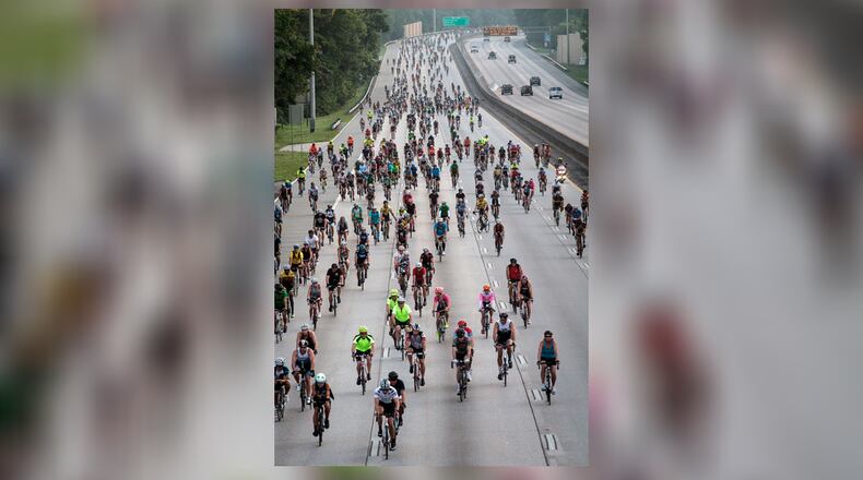 Cyclists head south on G.a. 400 during the Ga. 400 Bike Ride July 9, 2017, in Roswell, Ga. A portion of Ga. 400 was closed off during the ride. STEVE SCHAEFER / SPECIAL TO THE AJC