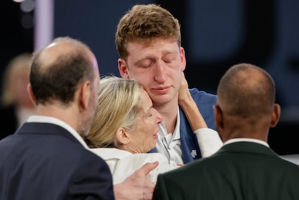 Danny Wolf reacts after being selected 24th by the Brooklyn Nets in the first round of the NBA basketball draft, Wednesday, June 25, 2025, in New York. (AP Photo/Adam Hunger)