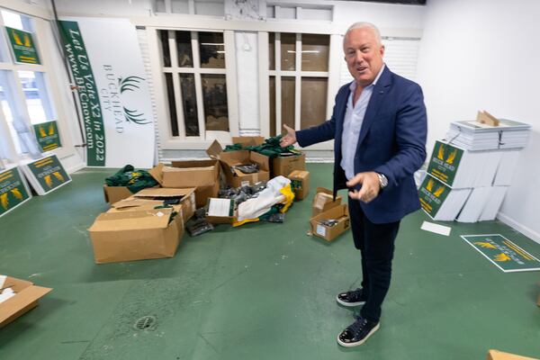 Bill White looks through some of the boxes that are left to move from the Buckhead City Committee Headquarters in 2023.  Steve Schaefer/AJC 2023