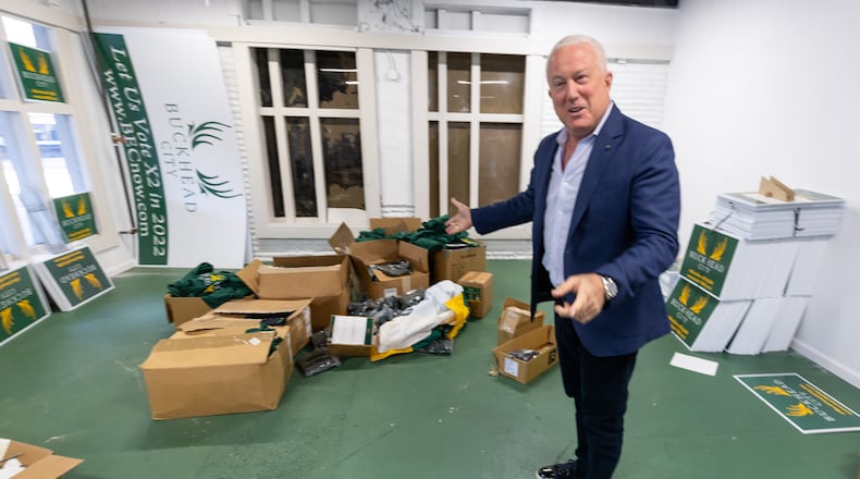 Bill White looks through some of the boxes that are left to move from the Buckhead City Committee Headquarters Thursday, Mar. 30, 2023. (Steve Schaefer/steve.schaefer@ajc.com)