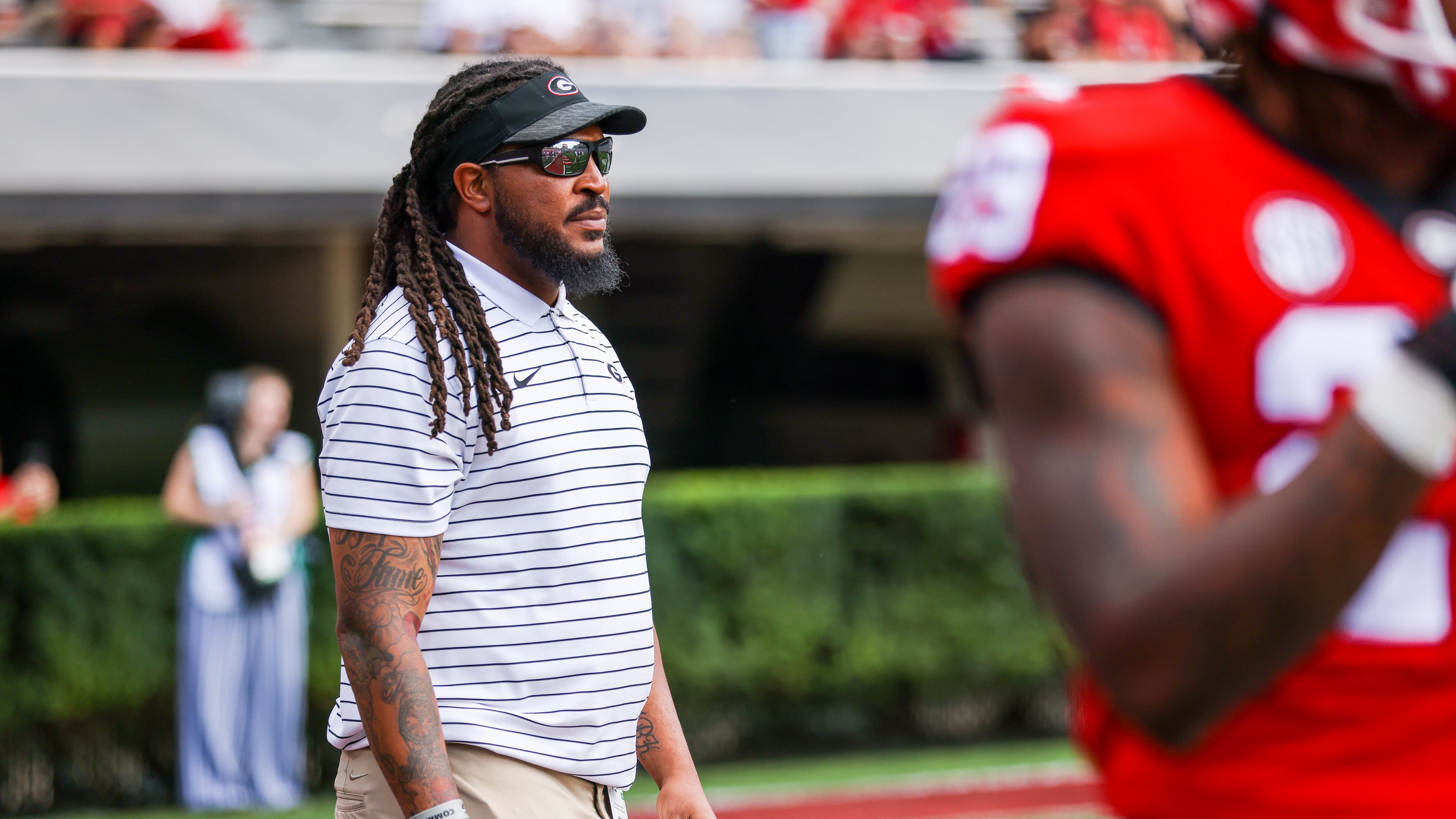 Former Georgia linebacker Jarvis Jones watches the Bulldogs warm up before playing their annual G-Day spring scrimmage at Sanford Stadium in Athens, Ga., on Saturday, April 15, 2023. (Courtesy of Tony Walsh/UGA Athletics)