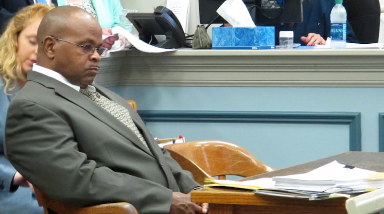 John Wayne Johnson sits at a courtroom table before pleading guilty to five counts of first-degree vehicular homicide and other charges in Pembroke, Ga. on Thursday, July 14, 2016. Johnson was driving a tractor-trailer that slammed into stalled traffic on Interstate 16 west of Savannah on April 22, 2015. The collision killed five nursing students from Georgia Southern University. (AP Photo/Russ Bynum)