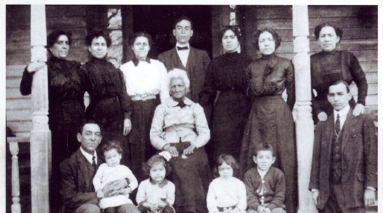 Kittie Simkins and William Ramey had nine children. Their great-great-great granddaughter, Paula Wright, was able to locate the only surviving image of the family gathered on the front porch of the family home on the day of Ramey’s funeral in 1913. CONTRIBUTED BY PAULA WRIGHT
