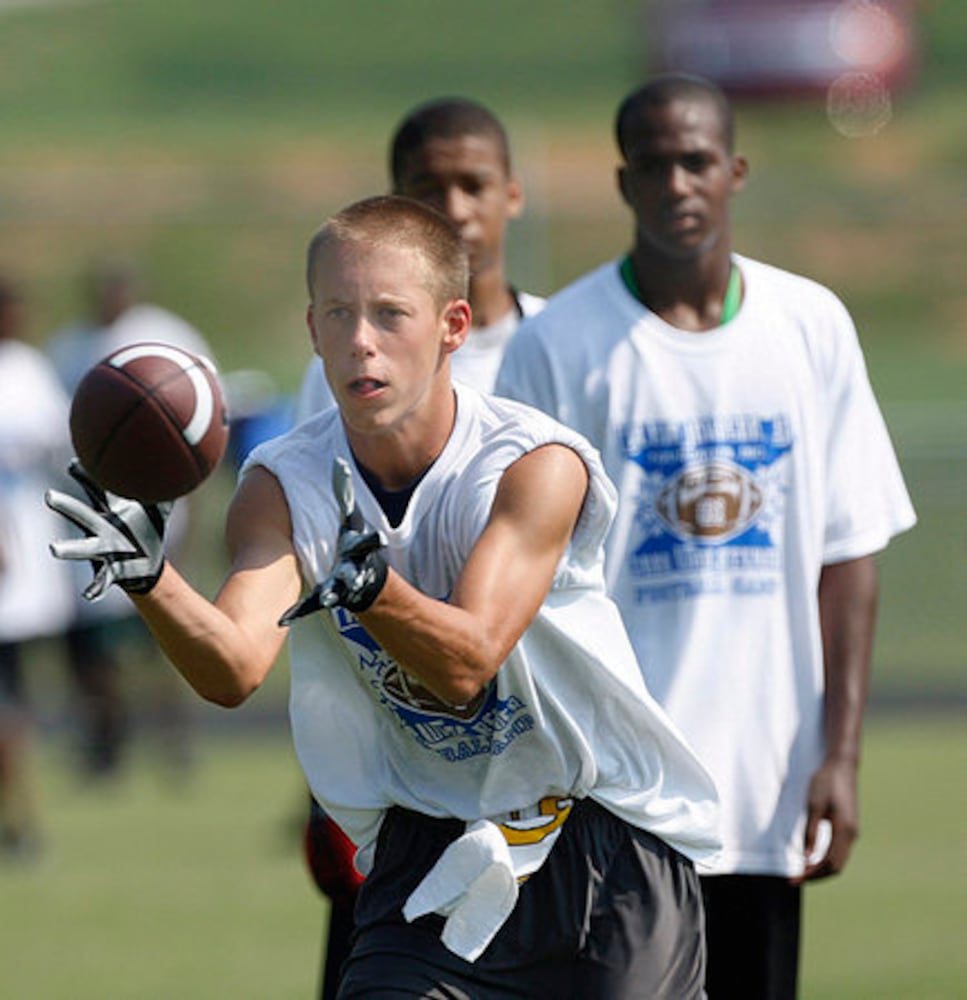 Calvin Johnson hosts youth football camp