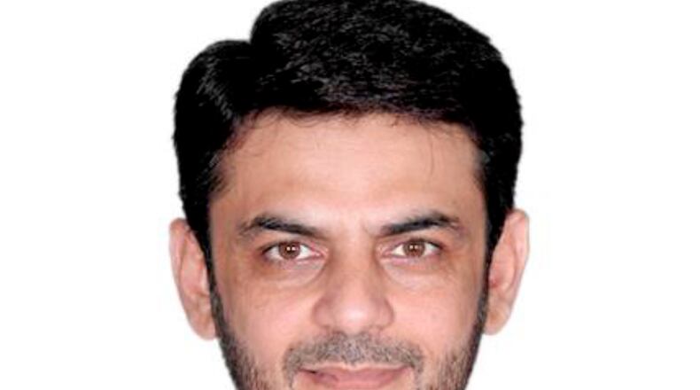 FILE - This image provided by the Justice Department, contained in the complaint supporting the arrest warrant, shows Asif Merchant. (Justice Department via AP, File)