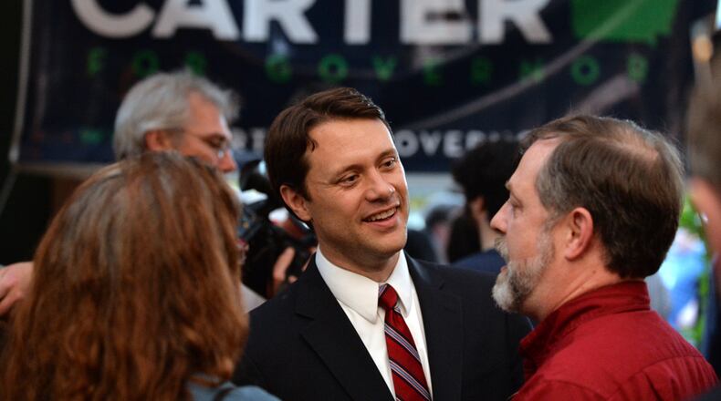 DEMOCRATIC GOVERNOR PRIMARY--May 20, 2014 Sandy Springs, GA: Jason Carter speaks to supporters during his election night party at the 5 Seasons Brewing Company in Sandy Springs Tuesday May 20, 2014. The former senator is running unopposed in the Democratic primary. BRANT SANDERLIN /BSANDERLIN@AJC.COM