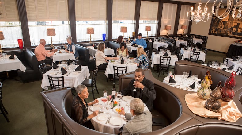The dining room at Petite Auberge. / Photo by Michie Turpin Photography.