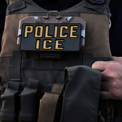 FILE - A U.S. Immigration and Customs Enforcement agent is seen in Park Ridge, Ill., Sept. 19, 2025. (AP Photo/Erin Hooley, File)