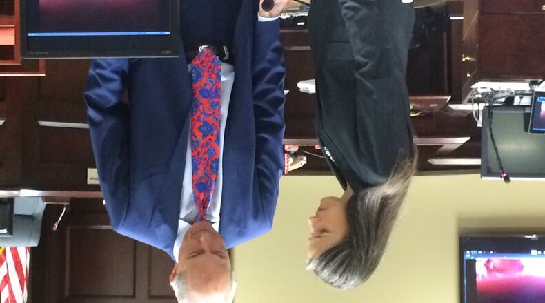 Nydia Tisdale, left, consults with attorney Bruce Harvey at a hearing in Dawsonville Oct. 4, 2016. CHRIS JOYNER / CJOYNER@AJC.COM