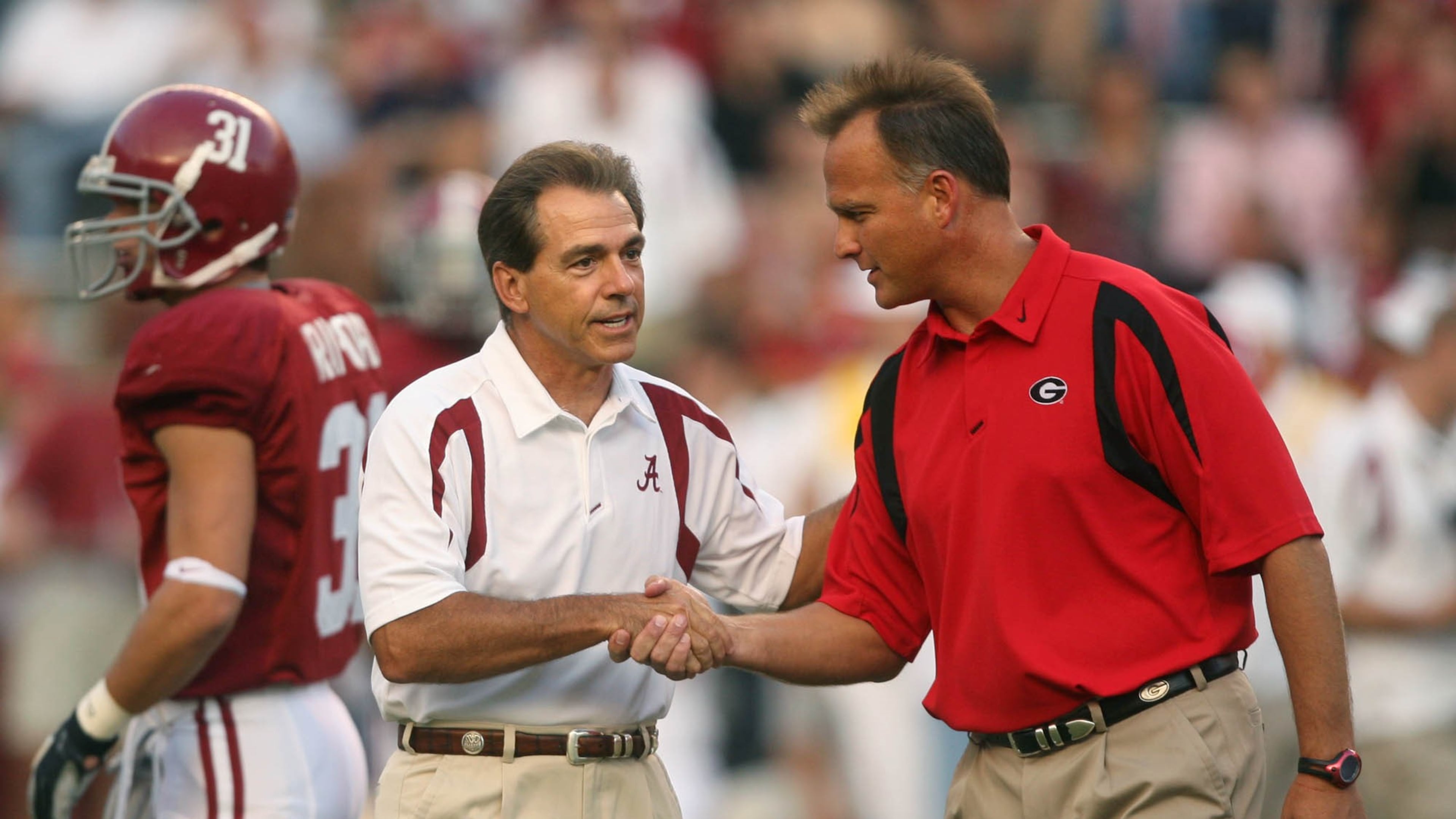 Jason Getz captured this image of Nick Saban and Georgia coach Mark Richt before the teams met in Tuscaloosa in 2007. It was Saban's first season at Alabama, and Georgia won the game 26-23 in overtime. (Jason Getz/AJC)
