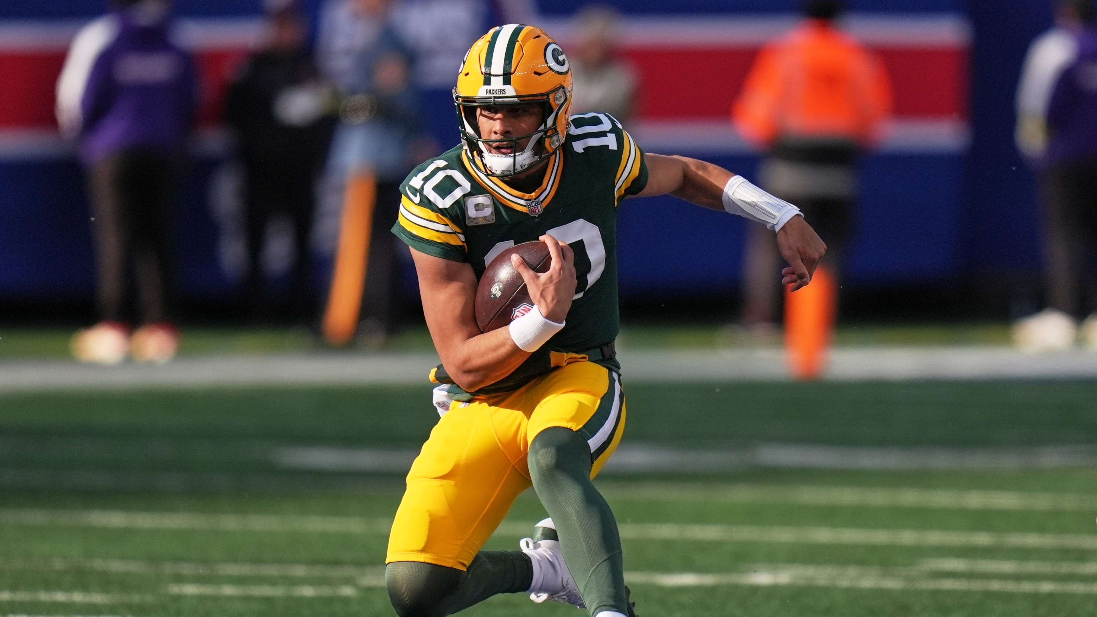 Green Bay Packers' Jordan Love runs during the first half of an NFL football game against the New York Giants Sunday, Nov. 16, 2025, in East Rutherford, N.J. (AP Photo/Seth Wenig)
