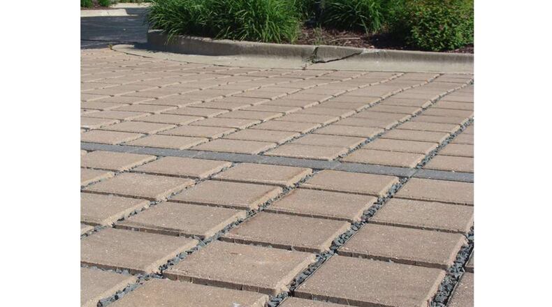 Permeable pavers like these allow rainwater to go directly into the soil rather than running off. Roswell has gotten grant funds to extend a permeable paver project on Zion Circle.