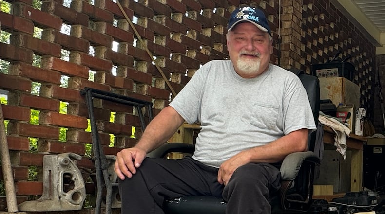 Ron Gordon, a Trump supporter, in his carport in Byron, a pocket of Peach County where Republican presidential contenders regularly fare well. (Joe Kovac Jr. / AJC)