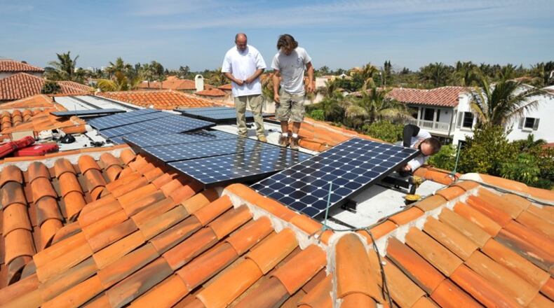 Roswell has endorsed a “Solarize Roswell” campaign by Solar Crowdsource to encourage residents and businesses to install photo-voltaic systems like these. AJC FILE