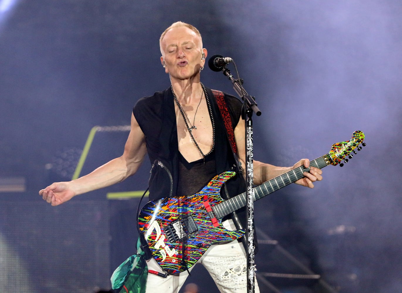 After two years of Covid cancellations, Def Leppard, Motley Crue, Poison and Joan Jett and the Blackhearts rocked sold out Truist Park on Thursday, June 16, 2022.
Robb Cohen for the Atlanta Journal-Constitution
