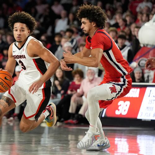Georgia guard Jordan Ross dribbles the ball against Mississippi guard Patton Pinkins during an NCAA college basketball game, Wednesday, Jan. 14, 2026, in Athens, Ga. Pinkins scored the game-winner as Ole Miss knocked off No. 21 Georgia in overtime, 97-95. (Brynn Anderson/AP)