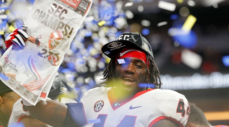 Georgia's Juwan Taylor celebrates beating the Auburn Tigers in the SEC Championship. Getty file.