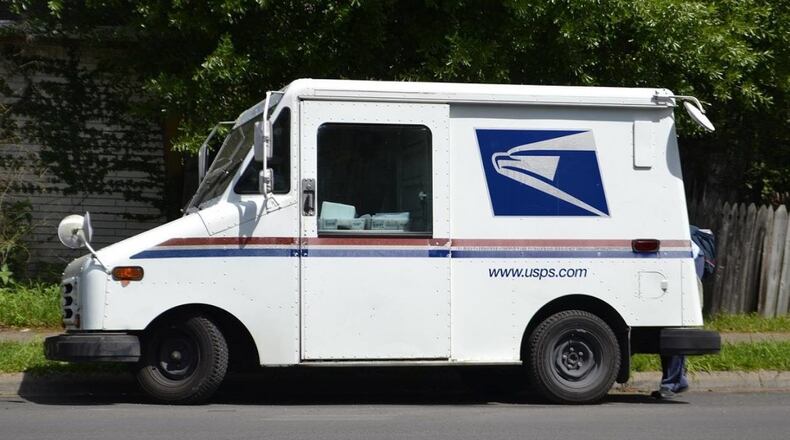 A woman allegedly stole a U.S. Postal Service truck in Oregon, crashed, flipped the vehicle and then fled "shirtless" on foot, police said.