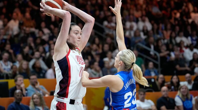 France's Marine Johannes guards Breanna Stewart, of the United States, during the Women's Basketball World Cup final match between the United States and France in Berlin, Sunday, Sept. 13, 2026. (AP Photo/Ebrahim Noroozi)