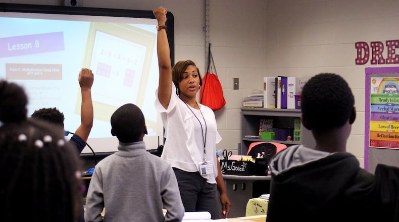 Sandrea Goree, a teacher at Perkerson Elementary School, instructs her students to count by twos on Thursday, August 15. Jenna Eason / Jenna.Eason@coxinc.com