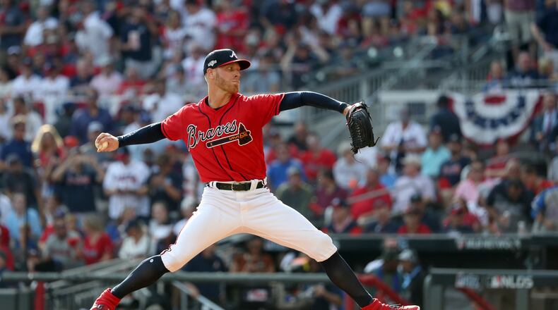 Braves starting pitcher Mike Foltynewicz delivers  during Game 2 of the NLDS at SunTrust Park  on Friday.