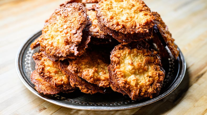 Chi-chi cookies from Proof Bakeshop are coconut macaroon sandwiches with chocolate ganache. CONTRIBUTED BY HENRI HOLLIS