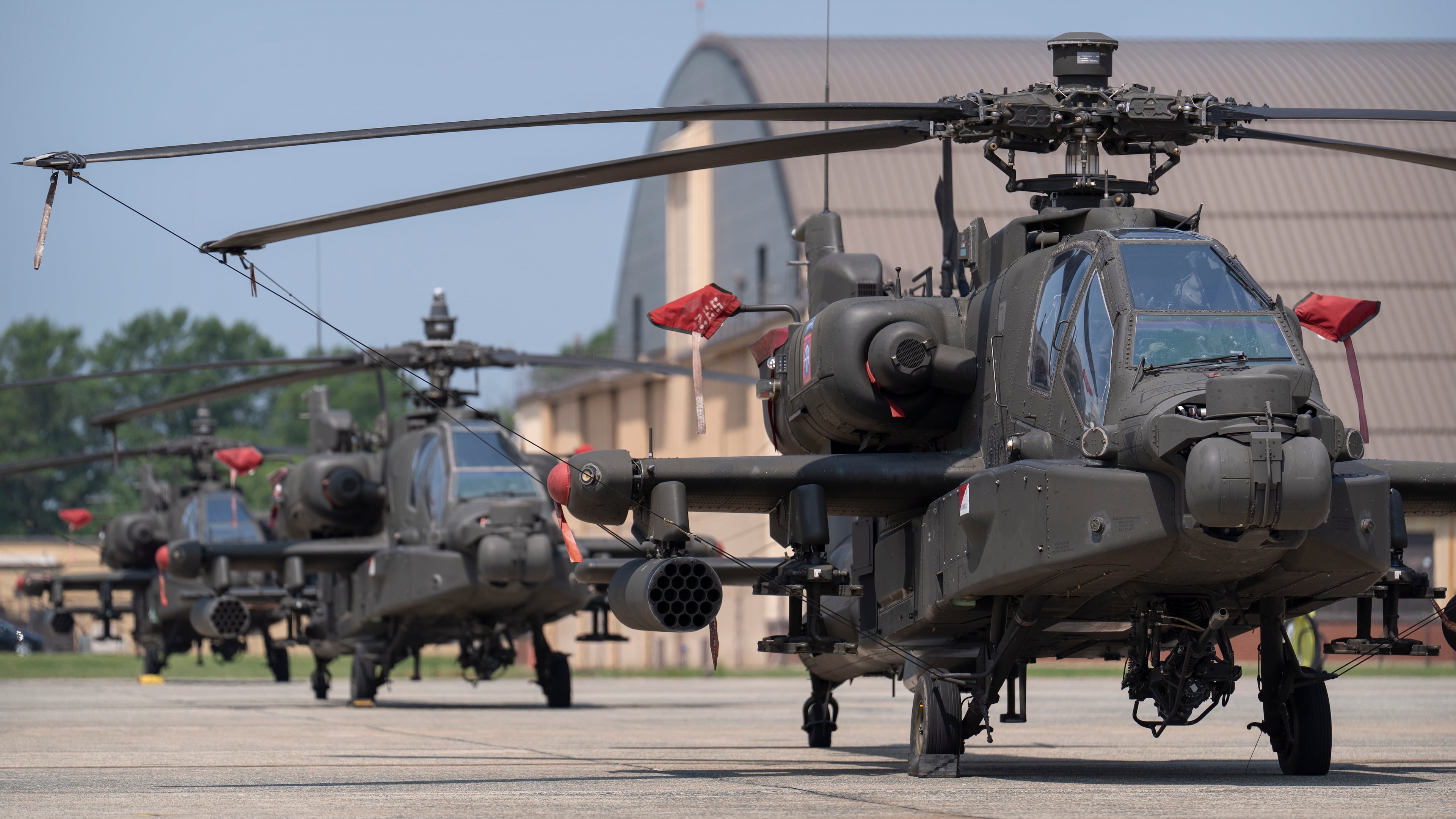 FILE - U.S. Army AH-64E Apache helicopters are pictured at Joint Base Andrews, Md., June 12, 2025. (AP Photo/Mark Schiefelbein, File)