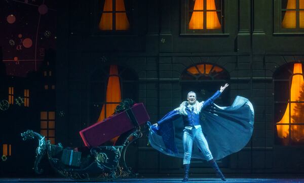 Jacob Bush gives a grand flourish in his role as Drosselmeier in Atlanta Ballet's "The Nutcracker."