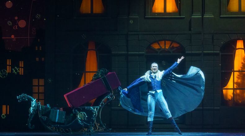 Jacob Bush gives a grand flourish in his role as Drosselmeier in Atlanta Ballet's "The Nutcracker."
