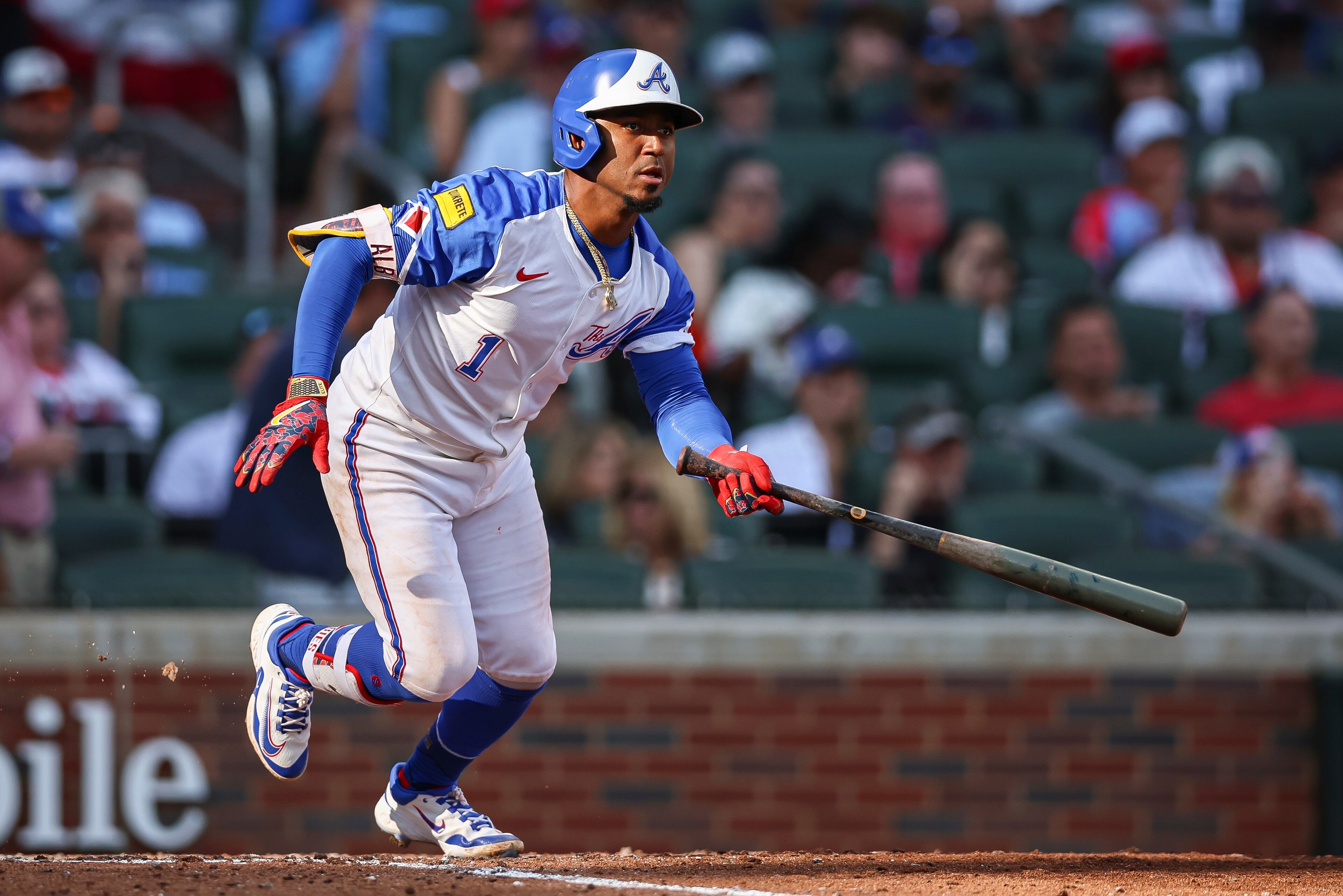 Atlanta Braves' Ozzie Albies (1) hits a single in the seventh inning of a baseball game against the San Diego Padres, Saturday, May 24, 2025, in Atlanta. (AP Photo/Colin Hubbard)