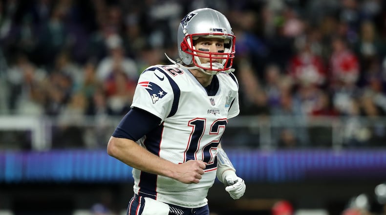 MINNEAPOLIS, MN - FEBRUARY 04: Tom Brady #12 of the New England Patriots looks on the first half of Super Bowl LII against the Philadelphia Eagles at U.S. Bank Stadium on February 4, 2018 in Minneapolis, Minnesota. (Photo by Elsa/Getty Images)