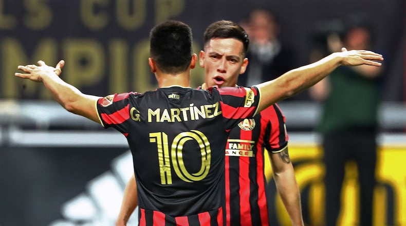 Atlanta United midfielder Ezequiel Barco (right) celebrates his goal with Pity Martinez, who had the assist, for a 1-0 lead over FC Cincinnati in a MLS soccer match on Saturday, March 8, 2020, in Atlanta. Curtis Compton ccompton@ajc.com