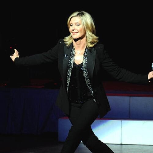 Olivia Newton-John was appointed as an Officer of the Order of Australia by Queen Elizabeth for her philanthropic work with organizations supporting the environment and breast cancer research. Newton-John was born in Cambridge, England, but grew up in Australia. (AJC File)
